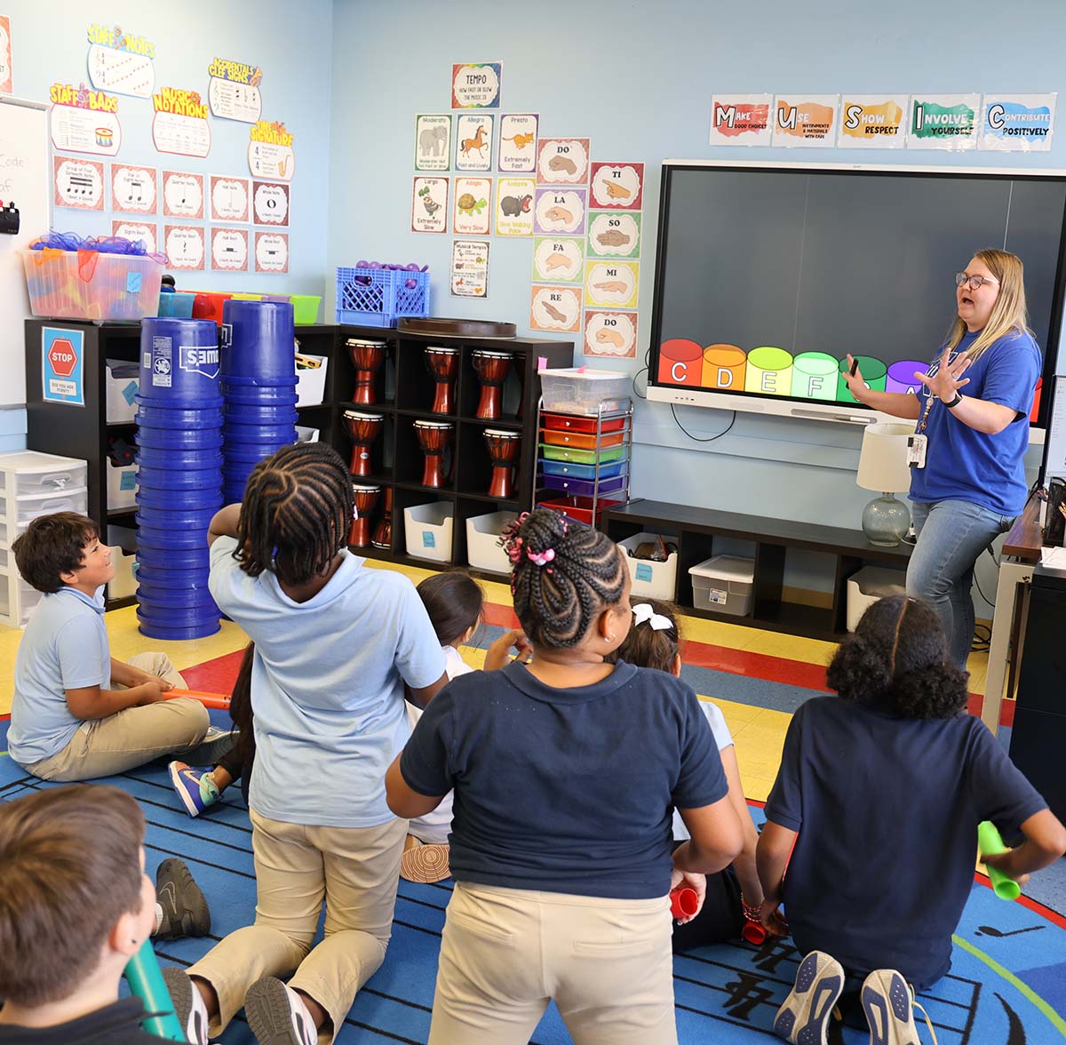 Noble Academy Euclid Teacher and student interacting at a classroom desk